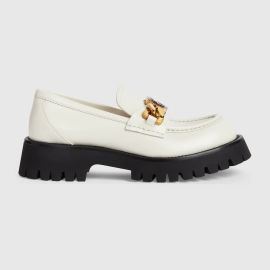 Womens lug sole loafer in white leather at Gucci